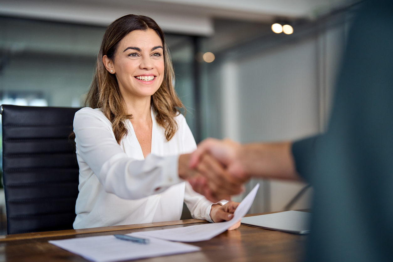 Business financing meeting and handshake