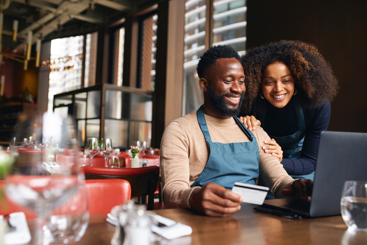 Business owners reviewing financing options
